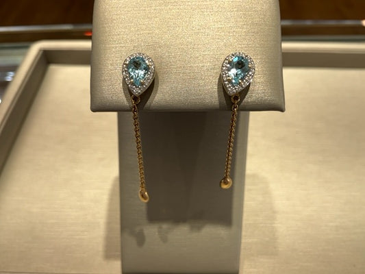 Maharaja Collection Pear Blue Topaz Dangle Earrings with Round Diamond Accent in 14K Yellow Gold (0.14ctw)